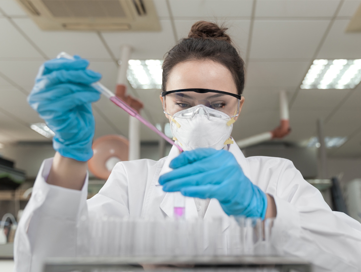 young woman working in a lab
